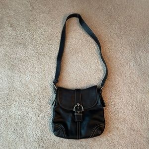 Coach Black Leather Crossbody Purse with lots of pockets.